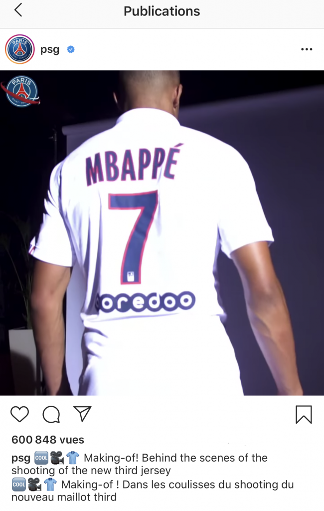 Ici se trouve la capture d'écran d'une publication Instagram du PSG. On peut voir Kylian Mbappé de dos, portant le nouveau maillot de l'équipe